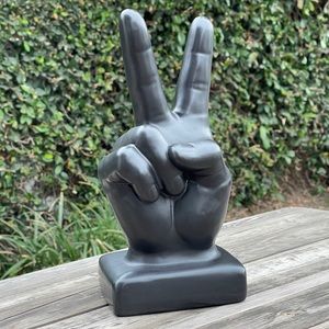 Large ceramic peace sign hand sculpture